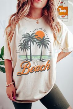 Take Me To The Beach Summer Retro Vintage Style Top Palm Trees And Sun Beach Lovers Tee. Distressed Beach Scene Graphic T-shirt. Crew Neck Tops For Beach Season Summer Activities, Summer T-shirt For Beach Season Activities, Graphic Print T-shirt For Beach Season, Beachy Tops For Beach Season, Short Sleeve Graphic Print Tops For Summer, Graphic Print Short Sleeve Tops For Summer, Crew Neck T-shirt For Beach Season, Graphic Print Graphic Tee Tops For Summer Activities, Graphic Tee Tops With Graphic Print For Summer Activities