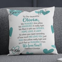 a pillow on a couch with the words to our beautiful queen written in cursive font