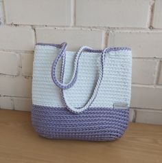 White handmade crochet tote bag from rope.  Perfect for the beach and for shopping. Bag is made of thick polyester rope. Color white and blue -gray. Size: height 28 cm [11 in], width 36 cm [14 in] You may custom order this design in this or different color and size. Strong Washable  Thank for your visit White Crochet Travel Bag With Braided Handles, White Crochet Bag With Braided Handles For Travel, Casual White Handwoven Shoulder Bag, Everyday White Handwoven Straw Bag, White Handwoven Straw Bag For Everyday, White Rectangular Crochet Bag For Beach, White Handwoven Crochet Summer Bag, White Handmade Crochet Travel Bag, White Handwoven Crochet Bag For Daily Use