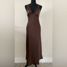 Material: 97% Poly 3% Spandex Approx Measurements Laying Flat Pit To Pit 15" Waist 14" Length 50" Brown Fitted V-neck Slip Dress, Fitted Satin Sheath Maxi Dress, Fitted V-neck Satin Maxi Dress, Fitted Satin Maxi Dress With V-neck, V-neck Stretch Satin Midi Dress, Fitted V-neck Midi Dress With Bias Cut, Fitted Brown V-neck Slip Dress, Fitted Brown Slip Dress For Evening, Brown Fitted Slip Dress For Evening