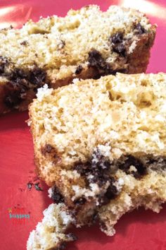 two pieces of cake sitting on top of a red plate