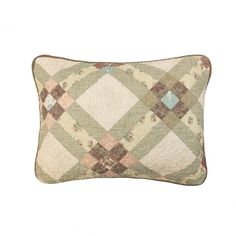 a green and white quilted pillow on a white background