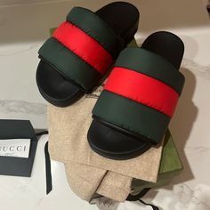 New In Box - Includes Gucci Gift Bag - Receipt- Dust And And Box- Never Used - Gucci Designer Slides With Cushioned Footbed, Designer Gucci Slides With Cushioned Footbed, Gucci Green Flat Sandals, Green Flat Gucci Sandals, Designer Slides With Cushioned Footbed, Designer Gucci Green Sandals, Designer Gucci Slides, Designer Green Gucci Sandals, Red Gucci Slides With Branded Insole