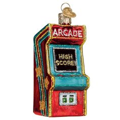 an arcade game ornament hanging on a wall