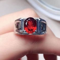 This Ring is made of Natural Garnet Gemstone, The Metal Is Sterling Silver and also available in 9k,14k, 18k Solid Gold. Garnet Mens Ring, Garnet Ring Men, 7x9mm Oval Cut Garnet Engagement Ring For mens, Male Ring, Red Garnet ring, Father's Ring, Gift For Husband/ father, January Birthstone,9k/14/18k Yellow gold, Rose Gold, White Gold Garnet Ring Product Details: - Material:- 925 Sterling Silver/9k/14k/18k Solid Gold Main Stone:- Natural Garnet Stone size:- 7x9mm (Oval cut) Stone Weight :- 3ct A Luxury Classic Men's Garnet Ring, Silver And Gold Wedding Ring, Wedding Ring For Man, Silver And Gold Wedding, Male Ring, Ring For Man, Garnet Engagement Ring, Red Garnet Ring, Ring Man