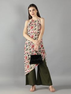 Ivory Floral Print Flower Lace Halter Neck Assymetrical Kurta with Olive Green Flared Pant Cotton ivory floral print kurta with flared pant set will always keep your work day or outing day stylish Assymetrical draw string kurta with halter neckline and flower lace detailing. Pant comes with two side pockets and back elastic wais band. Cotton cambric fabric for relaxed summer look Cold wash and Dry clean only Product doesn't have lining Lining Material: No lining Pattern: Floral Print Fit: Fitted Lining Pattern, Kurti Neck, Kurti Neck Designs, Print Flower, Flower Lace, Halter Neckline, Pant Set, Pattern Floral, Halter Neck