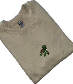 Cotton Crew Neck Sweatshirt With Embroidered Patch, Casual Crew Top With Machine Embroidery, Embroidered Crew Neck Sweatshirt For Streetwear, Casual Green Sweatshirt With Embroidery, Casual Embroidered Crew T-shirt, Custom Embroidery Crew Neck Sweater For Streetwear, Green Crew Neck Sweatshirt With Machine Embroidery, Green Crew Neck Sweatshirt With Embroidery, Save The Turtles