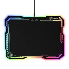 a computer mouse pad with an arrow on the front and back side in rainbow colors