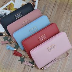 Designer Clutch Wallet Large Capacity Card Holder Money Bag Female Purse Ladies Tassel Wristband Carteira Multifunctional WalletsMaterial : PU LeatherSzie: 19.5cm* 10cm* 2.5cm (7.7" * 3.9" * 1")Color: black, pink, red, dark-pink, blue Large Capacity Rectangular Wallet, Trendy Rectangular Wallet, Trendy Wallets For Mobile Phones, Versatile Wristlet With Card Slots, Trendy Daily Use Wristlet, Trendy Wristlet With Card Slots, Trendy Rectangular Wallet With Wrist Strap, Trendy Rectangular Wallets With Wrist Strap, Cheap Purses