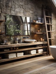 a bathroom with stone walls, wooden floors and a ladder leading up to the bathtub