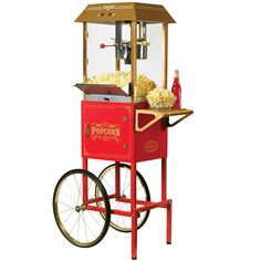 an old fashioned popcorn machine with wheels