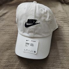 Sportswear Heritage 86 Unisex White Cap/Hat From Nike New, Never Worn One Size White Sporty Dad Hat With Curved Bill, Sporty White Dad Hat With Curved Bill, White Dad Hat For Sports, Cotton Dad Hat For Sports, White Curved Bill Dad Hat For Sports, Nike Sporty Dad Hat For Streetwear, White Snapback Dad Hat For Sports, Sporty Snapback Dad Hat For Spring, Sporty White Cotton Dad Hat