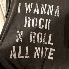 Brand New Graphic Tee. Front: I Wanna Rock N Roll All Nite Back: And Party Every Day #Kiss Gray Text Print Grunge Top, Grunge Gray Top With Text Print, Gray Band Merch Tops With Letter Print, Gray Band Merch Top With Letter Print, Rock Style Text Print Top For Concert, Rock Style Tops With Text Print For Concert, Rock Style Letter Print Tops For Fall, Edgy Gray Tops With Letter Print, Black Distressed Rocker Tops