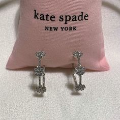 New! Never Worn! With Tags In Dust Bag Kate Spade Gleaming Gardenia Flower Hoop Earrings In Silver. Hoop Earrings With Comfort Disc Closure Boast Three Cz Embellished Gardenias Material: Surgical Steel Post With Silver Overlay. 55% Metal 45% Cubic Zirconia These Dazzling Earrings Make A Statement Whether You Are Dressed Up For A Night Out; Or Casually Running Round Town. Small Hoop Flower Earrings For Wedding, Flower-shaped Hoop Earrings For Anniversary, Flower Shaped Hoop Earrings For Wedding, Hoop Flower Earrings As A Gift, Purple Drop Earrings, Gardenia Flower, Kate Spade Earrings Stud, Glitter Stud Earrings, Kate Spade Studs