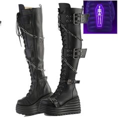 4 1/2" (114mm) Wedge Platform Lace-Up Front Thigh-High Boots 2 Double Grommet Buckle Straps W/ Metal Skull Knockers @ Center And 2 Lower Skull Buckle Straps, Skull Knockers On Outer Heel & Toe, Hanging Chain Detail, Inside Metal Zip Closure, Blacklight Reflective Back Coffin Demonia Women's Us Sizes Brand New Thigh High Goth Boots, Rocker Boots, Goth Boots, Demonia Shoes, White Sneakers Men, Metal Skull, Punk Rocker, Goth Punk, Goth Outfits