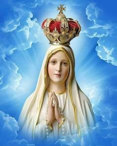 the virgin mary is wearing a crown and holding her hands in front of her chest