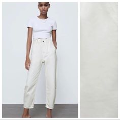 Nwt. Zara Cream Paperbag Baggy High-Waisted Pants With Carrot Legs Ankle Rigid Fit, Elastic Waistband, Front Pockets And Back Patch Pockets, Front Zip And Metal Button Closure. Size 2. Ref. 5862/055. Waist 11,5" Flat, Rise 12,5", Inseam 24". 1041. White High-waist Jeans For Work, Chic Baggy White Pants, Chic White Baggy Pants, Trendy Cream High-waisted Jeans, Casual Off White Pants For Workwear, Baggy Cream Bottoms For Spring, Casual White Jeans With Loosely Fitted Hips, Casual High Waist Off White Pants, Off White Pants With Pockets For Spring