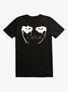 a black t - shirt with the word crow on it and two faces drawn in white