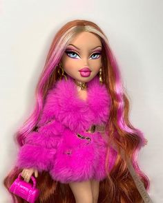 a barbie doll with long red hair wearing a pink fur coat and holding a pink purse