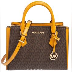 Michael Michael Kors 35t0gwxm8b Hope Mk Signature Logo Brown & Marigold Medium Messenger Satchel Bag Like New Euc - Gently Used A Couple Of Times From A Smoke/Pet Free, Clean & Healthy Home Please Check Out My Other Mk Bags & Feel Free To Make An Offer New To Poshmark? Sign Up Using Invite Code: Dancinggaby To Get A $10 Posh Shopping Credit!!! Gold Shoulder Bag With Logo Hardware For Travel, Gold Leather Bag With Logo, Gold Crossbody Bag With Logo, Gold Coated Canvas Bag With Handles, Gold Logo Crossbody Bag, Designer Brown Bags With Gold-tone Logo Plaque, Gold Bag With Gold-tone Logo Plaque And Double Handle, Travel Brown Bag With Gold-tone Logo Plaque, Brown Travel Bag With Gold-tone Logo Plaque