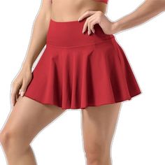 Red Short Skort With Built-in Shorts, Red Flared Skirt For Summer, Red Solid Color Summer Skirt, Red High-waisted Stretch Skort, Red High Waist Stretch Skort, Red Stretch High-waisted Skort, Red High Waist Stretch Skirt, Red Stretch Tennis Skirt, Casual Red Stretch Mini Skirt