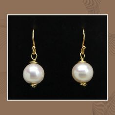 These elegant drop earrings are quality crafted using: > Natural Freshwater Pearls > German Style 24k Gold Plated Wire > 24k Gold Plated Jump Ring Connectors > 14k Gold Plated Solid 925 Sterling Silver (stamped) Ear Wires  They are the perfect accessory for adding a little color to your day or any outfit!  A great addition to any earring collection!  Classy - Elegant  Hypoallergenic & Nickel Free Ear Wires Pearl:  Size:  9-10mm  (3/8 inch) Drop Length:  25mm (1 inch) ❤️ Earrings are shipped with Nickel Free Classic Dangle Pearl Earrings, Classic Nickel-free Dangle Pearl Earrings, Classic Hypoallergenic Dangle Pearl Earrings, Classic Jewelry With Ear Wire For Gift, Hypoallergenic 14k Gold Filled Earrings For Anniversary, Minimalist Hypoallergenic Pear-shaped Jewelry, Minimalist Pear-shaped Hypoallergenic Jewelry, Handmade Classic Yellow Gold Pearl Earrings, Gift 14k Gold Pearl Earrings With Ear Wire