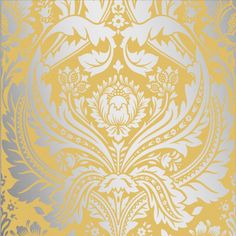 a yellow and silver wallpaper with an ornate design on it's side,