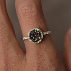 This is a gorgeous handmade creation. Its beauty is its simplicity & Elegance. The 7mm round cut mystic topaz is crafted in solid sterling silver and with rhodium plated. All item is sent in a beautiful gift box You can realize more lovely stuff clicking the link https://www.etsy.com/shop/knightjewelry?refshopsection_shophome_leftnav Please leave the correct address and you phone number for delivering successfully. Sterling Silver Birthstone Ring With Halo Setting, Sterling Silver Topaz Ring With Halo Design For Promise, Cubic Zirconia Topaz Ring With Round Stone, Silver Topaz Ring With Halo In Sterling Silver, Dazzling Sterling Silver Halo Ring With Gemstone, Sterling Silver Crystal Halo Ring, White Topaz Round Birthstone Ring, Silver Halo Topaz Ring In Sterling Silver, Fine Jewelry Silver Topaz Halo Ring