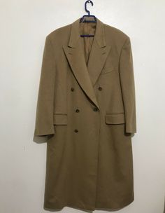 Loewe Trench Coat vintage winter jacket  Wool Cashmere double breasted Size 42 XL Measurements : SIZE           :     52EU / 42US /XL MENS PIT TO PIT   :    64CM        25.19 inch  LENGTH       :  125CM        49.21 inch    SLEEVE       :    63CM        24.80 inch SHOULDER :     55CM        21.65 inch Please check the measurement and size before buying  Shipping & Handling 1. We ship to your eBay  address. Please make sure your eBay a address is correct before you pay; 2. We ship within 1 busine Vintage Winter Blazer With Double Button Closure, Vintage Double Button Winter Blazer, Vintage Double-breasted Outerwear With Pockets, Vintage Double-breasted Pea Coat With Pockets, Vintage Double-breasted Blazer For Fall, Vintage Outerwear With Double Button And Lapel Collar, Vintage Single Breasted Long Coat, Vintage Single-breasted Long Coat, Vintage Long Single-breasted Coat