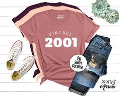 "-------Vintage 2001 (Unisex Tee)------- Wear this comfy t-shirt to celebrate your 21st birthday! Our solid color unisex tees are super soft ring-spun cotton...it's sure to be your new favorite tee (heather tees are a soft cotton-poly blend)! We use name brands like Bella+Canvas and District. We custom design, print, hand press, and carefully ship everything you see in our shop from our retail shop in Spokane, WA. All of our items are printed on quality apparel. -------SHIRT COLORS------- Please 21st Birthday Shirts, Baby Announcement Shirts, Funny Pregnancy Announcement, Pregnancy Reveal Shirt, 40th Birthday Shirts, Aunt T Shirts, Auntie Shirts, Aunt Shirts, Mama T Shirt