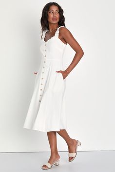 It's easy to envision a summer of ""amore"" in the Lulus Italian Romance White Ruffled A-Line Midi Dress With Pockets! Lightweight woven cotton shapes this simply adorable dress that has ruffled elastic straps and a darted bodice with a sweetheart neckline, all trimmed by matching ruffles. Decorative buttons accent the front, continuing across the fitted waist to the A-line midi skirt. Side seam pockets. Hidden zipper/clasp at back. Fit: This garment fits true to size. Length: Mid-calf length. B Cotton Midi Dress For Summer, Cotton Midi Dress With Ruffles For Day Out, Cotton Midi Sundress For Brunch, Summer Cotton Midi Dress For Daywear, Cotton Midi Dress For Spring, Summer Knee-length Cotton Midi Dress, Summer Midi Sundress For Daytime, Knee-length Cotton Midi Dress For Day Out, Cotton Midi Knee-length Dress For Day Out