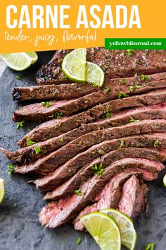 sliced flank steak on a cutting board with limes and cilantro garnish