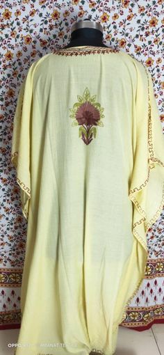 Yellow kaftan with a very unique design. The best product for just a stylish throw on! Free size Crush cotton Kaftan. Cotton Kaftan Straight Kurta For Summer, Cotton Straight Kurta Kaftan For Summer, Spring Long Sleeve Cotton Kaftan, Summer Embroidered Straight Kurta Kaftan, Traditional Tunic For Spring, Traditional Free Size Tunic For Spring, Cotton Kaftan With Kimono Sleeves, Embroidered Straight Kurta Kaftan For Summer, Free Size Cotton Kaftan With Kimono Sleeves