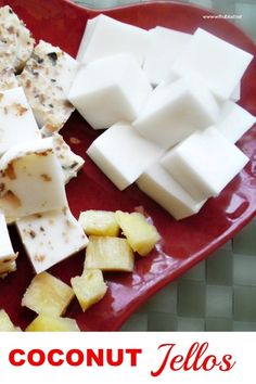 there are many different types of cheeses on this red plate with the words coconut jellos