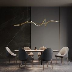 a modern dining room table with chairs and a chandelier hanging from the ceiling