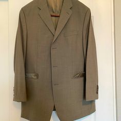 Never Worn Great Condition Suit, Comes With Suit Bag Pants Are Size 35x30 Jacket= 40r Material= Wool 3 Button Up Calvin Klein Single Breasted Blazer For Business, Classic Calvin Klein Blazer For Semi-formal Occasions, Calvin Klein Classic Blazer For Semi-formal Events, Calvin Klein Blazer With Welt Pockets And Notch Lapel, Classic Calvin Klein Single Button Blazer, Calvin Klein Classic Single Button Blazer, Calvin Klein Tailored Single Button Blazer, Tailored Single Button Calvin Klein Blazer, Calvin Klein Classic Long-sleeve Suits