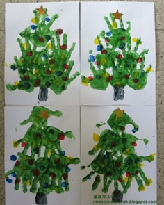 handprint christmas tree pictures on white paper with green and yellow colors, in the shape of trees