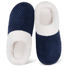 a pair of blue and white slippers sitting on top of each other