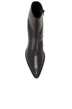 Leather upper with rubber sole.  Made in Vietnam.  Side zipper closure.  Leather footbed with textile lining.  Pointed toe with wooden block heel.  .  .  Approx 40mm/ 1.5 inch heel, Approx 159mm/ 6.25 inch shaft, Shaft measures approx 10.99" in circumference.  .  .  .  .  .  .  .  . Modern Heeled Boots With Contrasting Heel, Modern Calf Leather Heeled Boots With Contrasting Heel, Modern Heeled Boots With Block Heel And Leather Sole, Modern Heeled Boots With Contrasting Heel Counter, Modern Block Heel Boots With Leather Sole, Modern Block Heeled Boots With Leather Sole, Modern Boots With Stacked Low Heel, Modern Heeled Boots With Leather Sole, Modern Low Heeled Boots With Stacked Heel