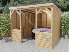 a wooden shed with a hot tub in it