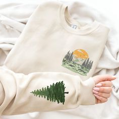 To ensure your order arrives in time for Christmas, please place your order before December 10th. Shipping carriers are extremely busy during the holiday season, and ordering early helps avoid delays. Thank you for shopping with us and making this holiday season extra special! 🎁Looking for a unique sweatshirt? 🌟 Product Details: .: Made with a medium-heavy fabric blend of 50% cotton and 50% polyester (8.0 oz/yd² (271.25 g/m this sweatshirt feels cozy and is the perfect choice for those colder Bohemian Cotton Sweater Relaxed Fit, Bohemian Cotton Sweater With Relaxed Fit, Bohemian Cotton Sweater In Relaxed Fit, Bohemian Relaxed Fit Cotton Sweater, Outdoor Long Sleeve Cotton Tops, Bohemian Long Sleeve Sweatshirt With Relaxed Fit, Relaxed Fit Long Sleeve Tops For Adventure, Casual Cotton Sweatshirt For Adventure, Bohemian Crew Neck Sweatshirt With Relaxed Fit