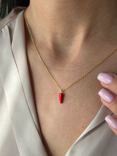 Spice up your style with our Red Chili Pepper Necklace 🌶️ Indulge in the irresistible charm of our Watermelon Necklace, crafted with high-quality elements to ensure lasting beauty ✨ Choose from 925K Sterling Silver, available in Gold, Rose Gold, or White Gold finishes. A timeless piece suitable for everyone, our Watermelon Necklace adds a touch of elegance to any ensemble 💙 Details: * Crafted from 925K Sterling Silver, plated with 14K Gold, Rose Gold, or White Gold * Chain length approximately Red Tarnish Resistant Necklace As Gift, Red Tarnish Resistant Necklace For Gift, Red Pendant Jewelry As Gift For Her, Red Pendant Jewelry As A Gift For Her, Red Sterling Silver Dainty Jewelry, Red Pendant Gold-plated Jewelry, Red Gemstone Jewelry Gift For Her, Red Dainty Sterling Silver Jewelry, Red Pendant Fine Jewelry