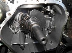 an engine is shown in this close up photo, with the front end removed from it's housing