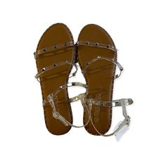 Falls Creek Womens Sandals Size 7 Clear Straps With Silver Studs Brand New. Gladiator Look Flat Sandals With Clear Strap For Spring, Beach Sandals With Clear Ankle Strap, Beach Sandals With Clear Strap And Open Toe, Spring Flat Sandals With Clear Strap, Casual Beach Sandals With Clear Strap, Casual Sandals With Clear Strap For Party, Summer Flat Sandals With Clear Strap, Summer Sandals With Clear Strap, Casual Sandals With Clear Strap And Round Toe