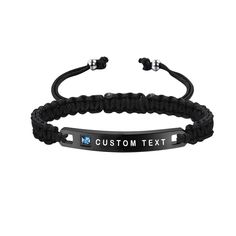 a black bracelet with the words custom text on it