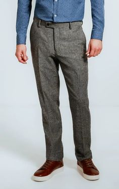 Great fabric and classic details are key to enduring tailoring - and they are all present in our Light Grey Donegal Tweed Trousers. Tailored from a durable wool-blend fabric woven with tonal grey coloured threads to create the iconic Donegal effect, these trousers has been cut in our regular fit block allowing for a little extra room through the hip and thighs to give a refined silhouette. Features include jetted pockets with button fastening and half-lining to the knee to ensure maximum comfort. When worn with the matching jacket, they will look as stylish today as in a decade. Wing Collar Shirt, Black Tie Tuxedo, Boys Waistcoat, Tweed Overcoat, Harris Tweed Jacket, Burgundy Tuxedo, Donegal Tweed, Black Suit Wedding, Double Breasted Waistcoat