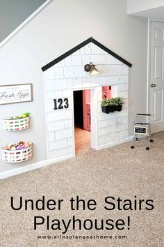 a play house with the words create an under stairs playhouse