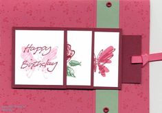 a birthday card with pink flowers and butterflies on the front, two cards have green trim around the edges