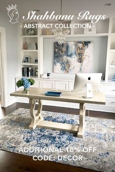 a desk with a laptop on top of it in front of a bookcase and bookshelf