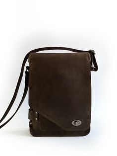 This bag has a separate padded protective compartment, designed especially for 12.9-inch iPad Pro or the latest 13.3-inch MacBook Pro. It is also large enough to carry A4 size document folder, another laptop of similar dimensions or iPad in a protective sleeve and it's accessories in the main compartment, books and everything else you need in everyday life. Made of 2 mm thick dark chocolate brown Crazy Horse cow leather, lined with checkered impregnated cotton fabric. Leather straps are underlai Rectangular Satchel With Luggage Sleeve For Everyday Carry, Leather Bag With Magnetic Closure, Rectangular Shape, Leather Bag With Magnetic Closure, Rectangular Laptop Sleeve Case For Everyday Use, Leather Satchel With Laptop Sleeve For Everyday, Leather Shoulder Bag With Laptop Sleeve For Everyday, Rectangular Laptop Sleeve Case, Leather Shoulder Bag With Laptop Sleeve, Everyday Rectangular Laptop Sleeve Case